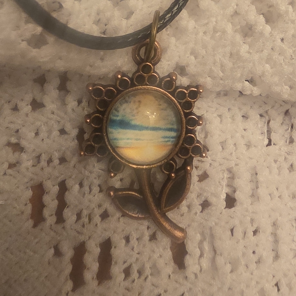 Sunset Beach In Flower Shaped Pendant On 18" Adjustable Cord Necklace